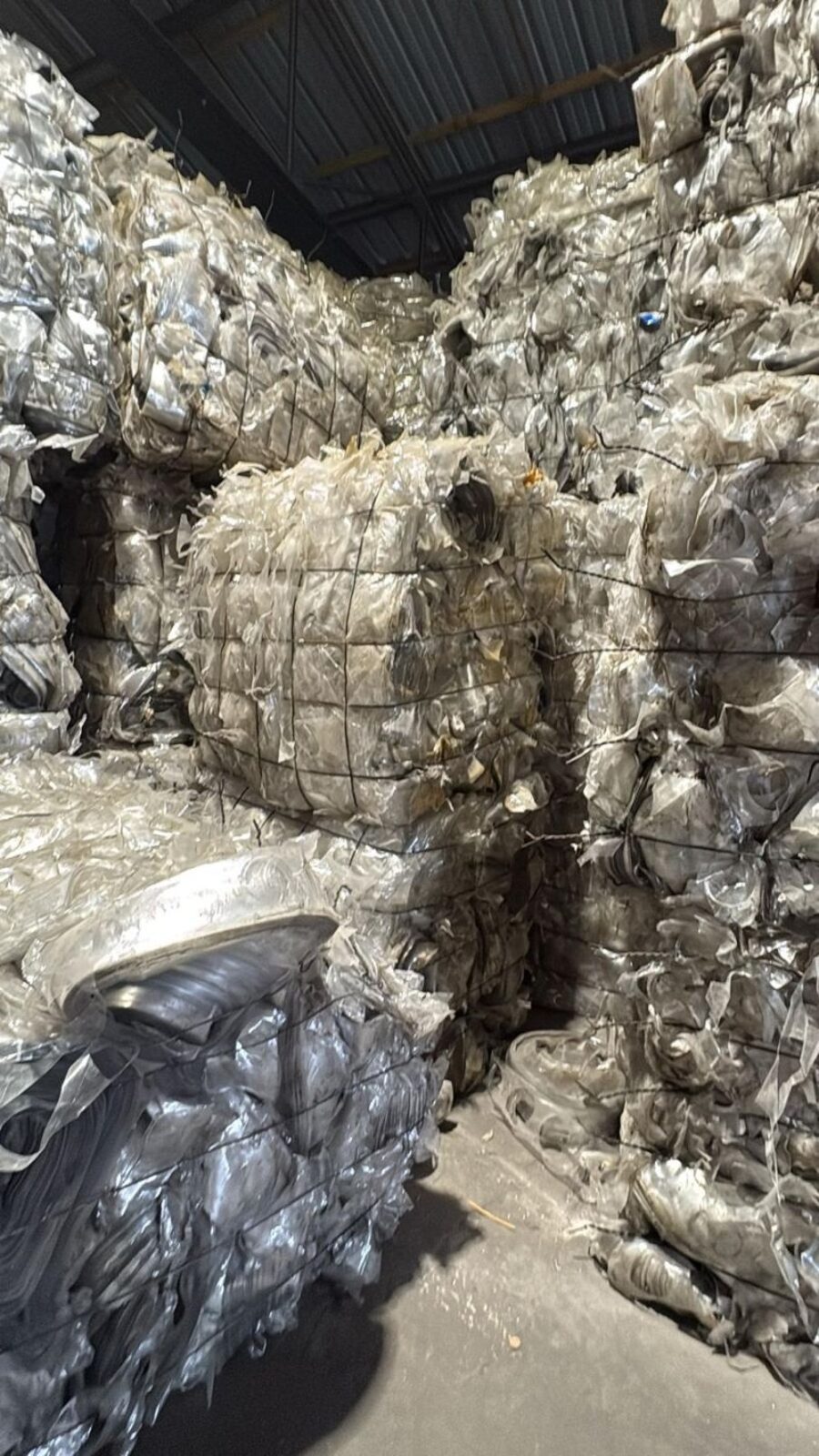 Aluminium scrap warehouse — baled and sorted.